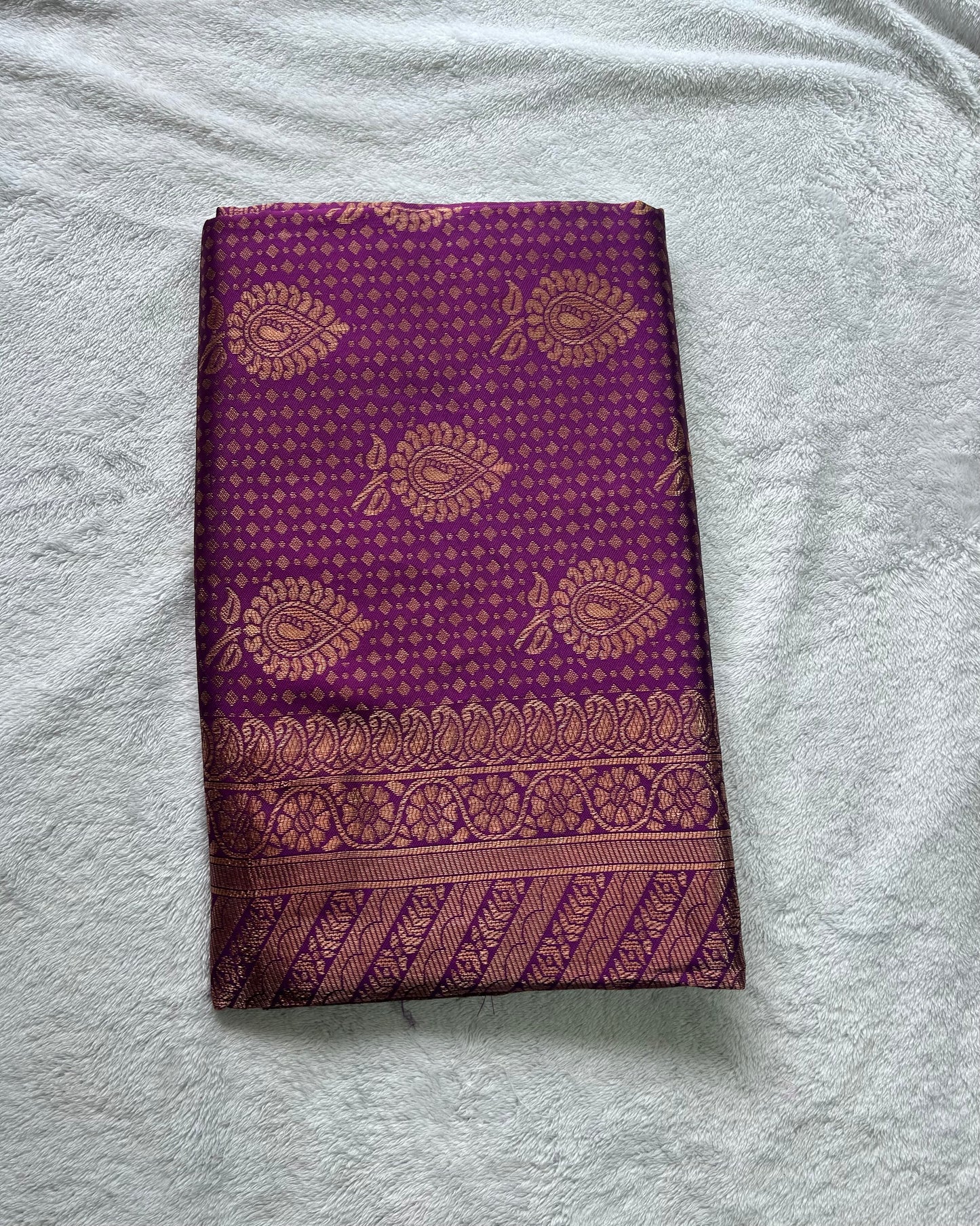 Violet semi silk fancy saree with all over zari work