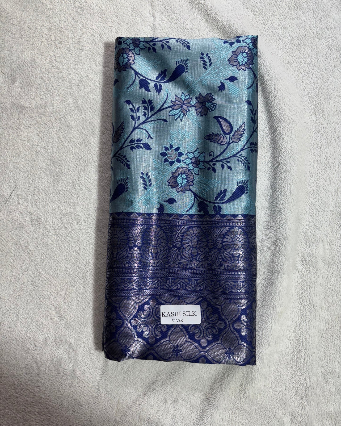 Sky blue with navy blue contrast blouse semi silk saree