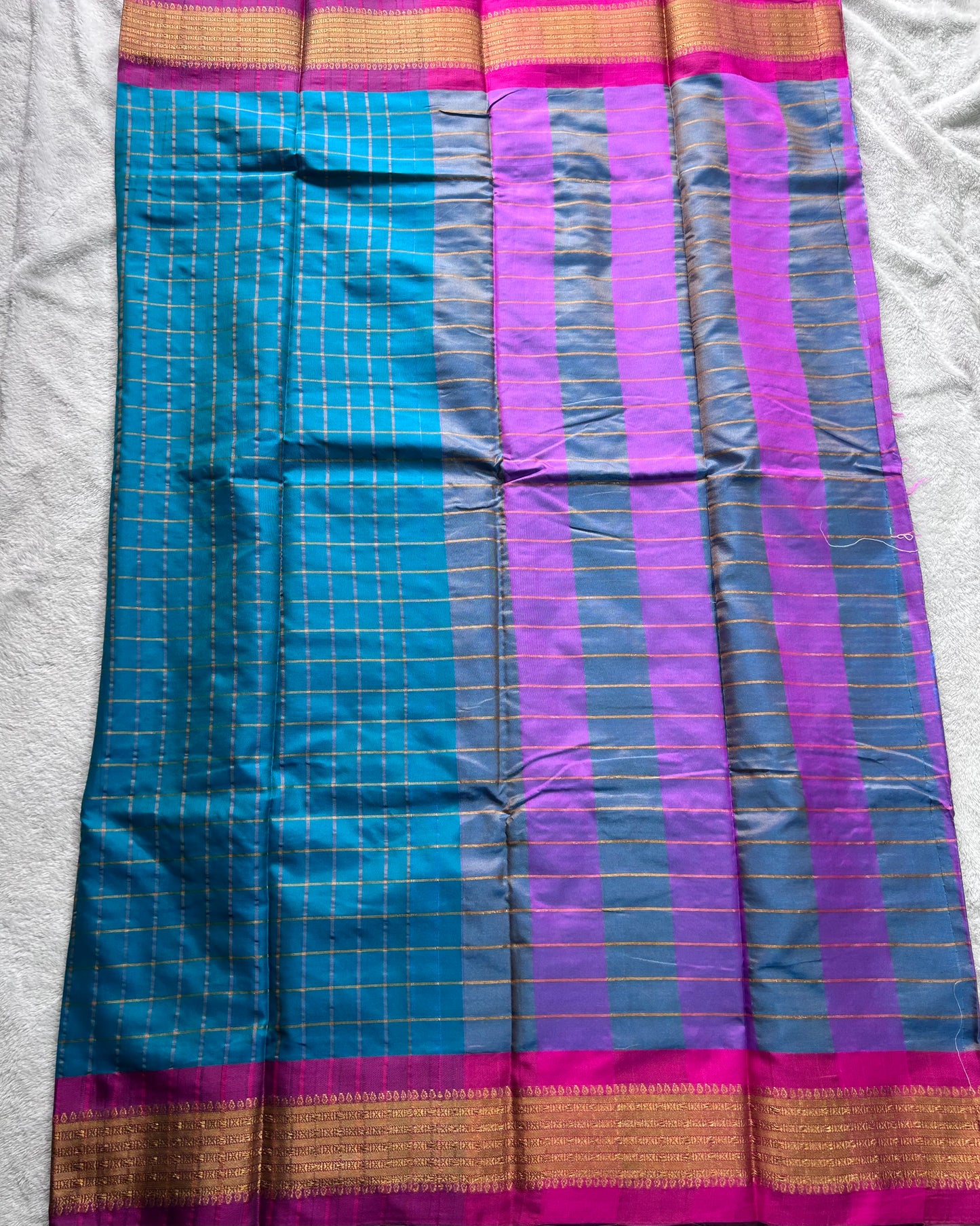 Teal green with checks pattern semi silk saree