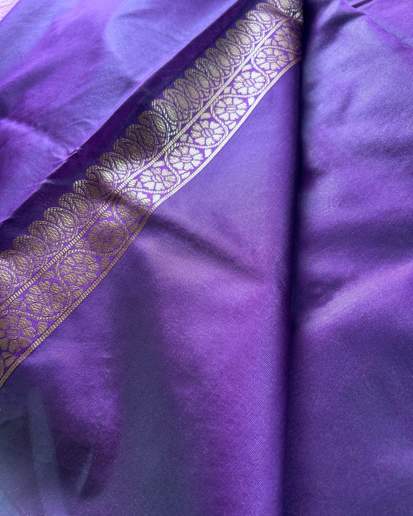 Violet semi silk fancy saree with all over zari work