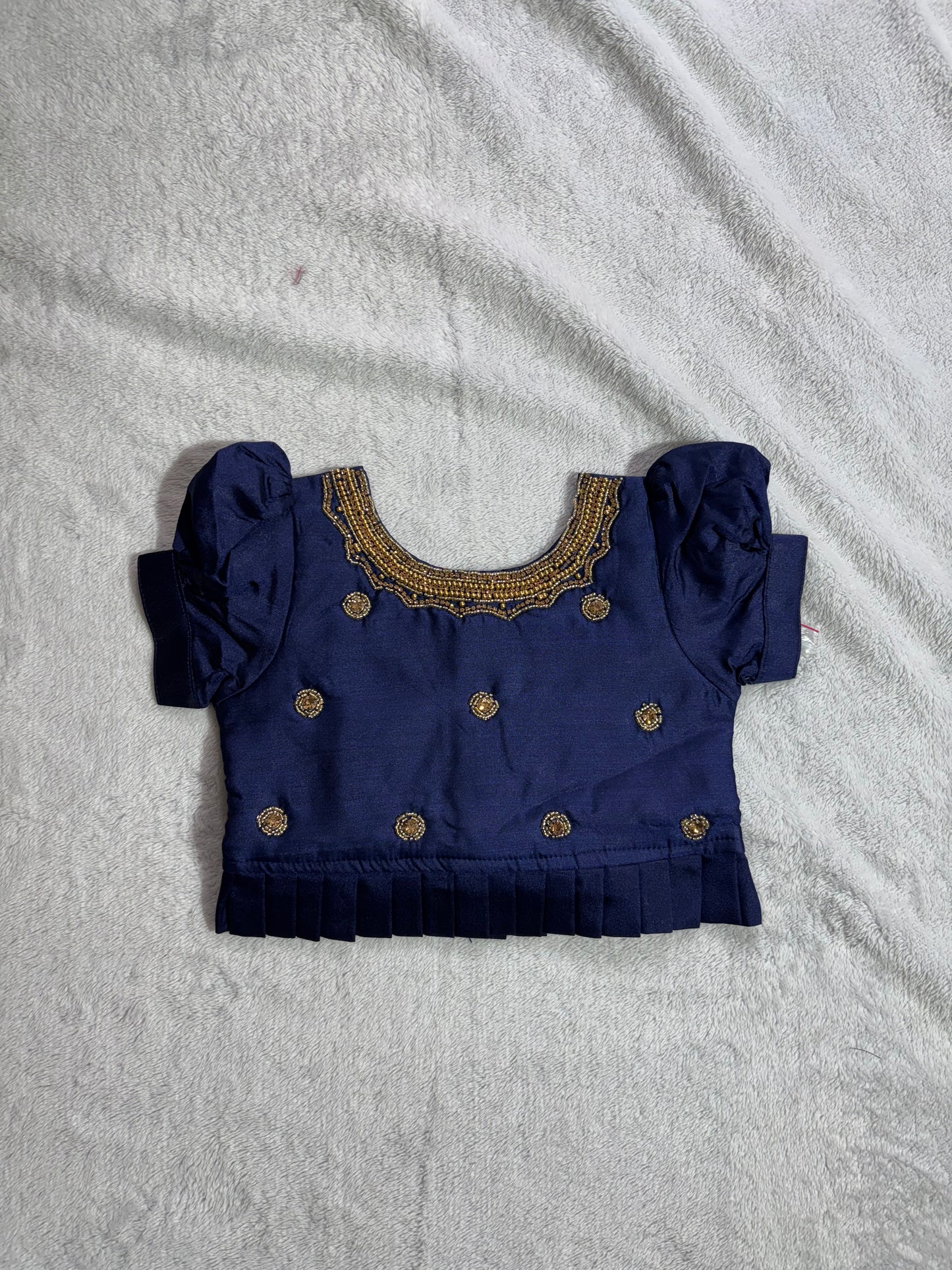 Navy blue blouse with handmade are work all over and pista green lehenga pattu pavadai