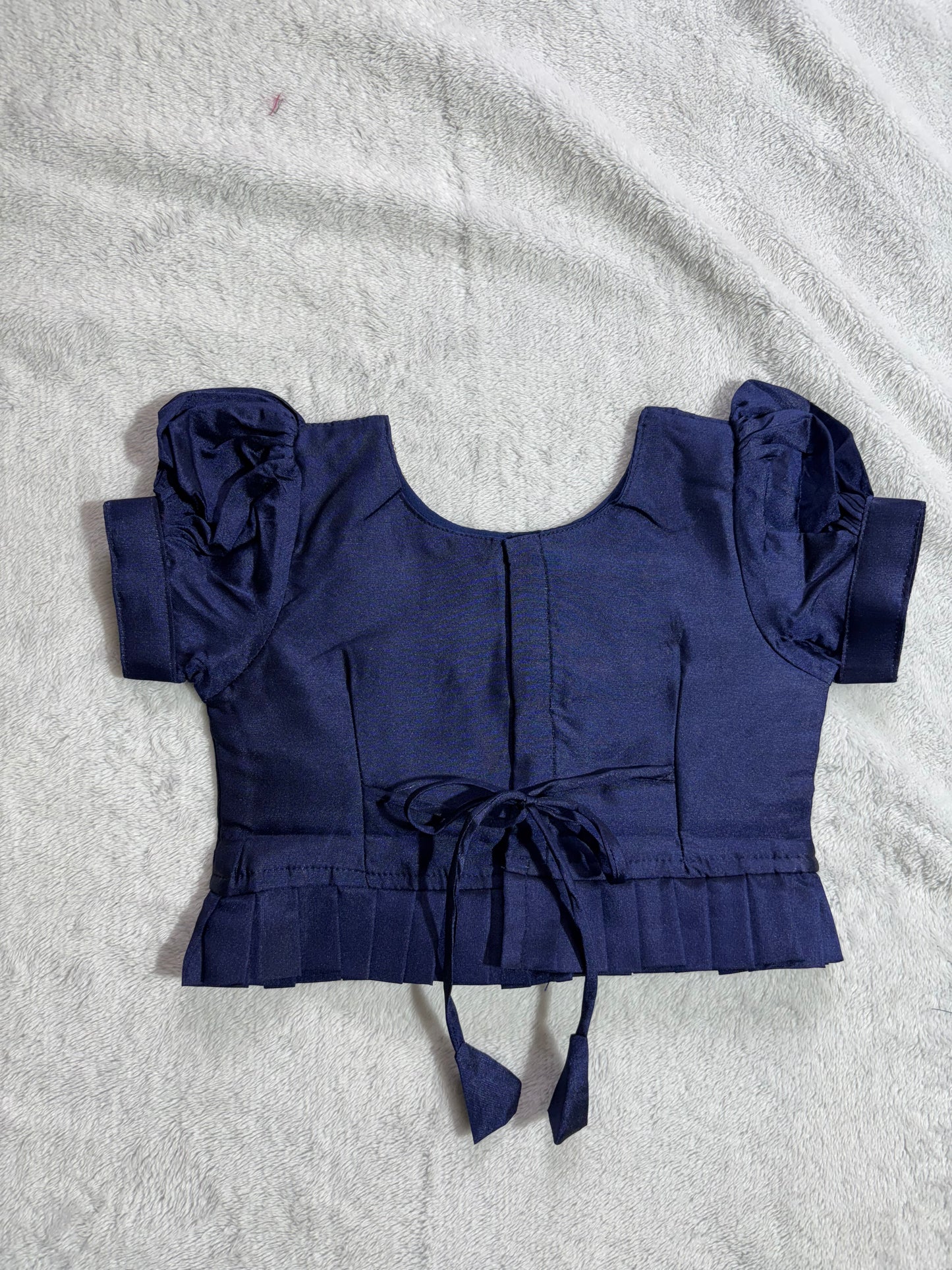 Navy blue blouse with handmade are work all over and pista green lehenga pattu pavadai