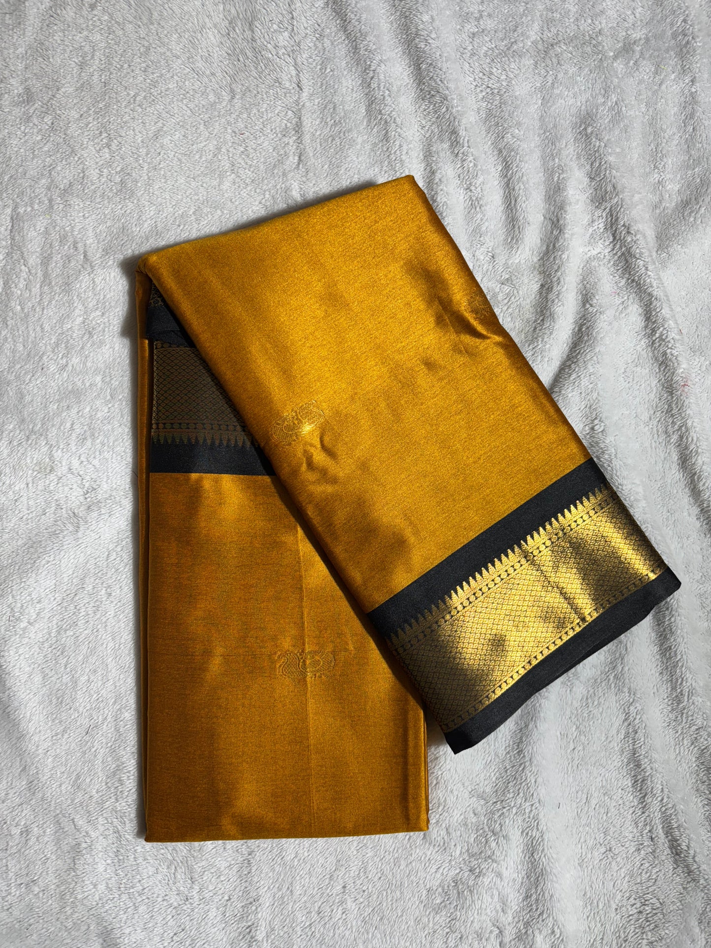 Mustard yellow with black silk cotton saree