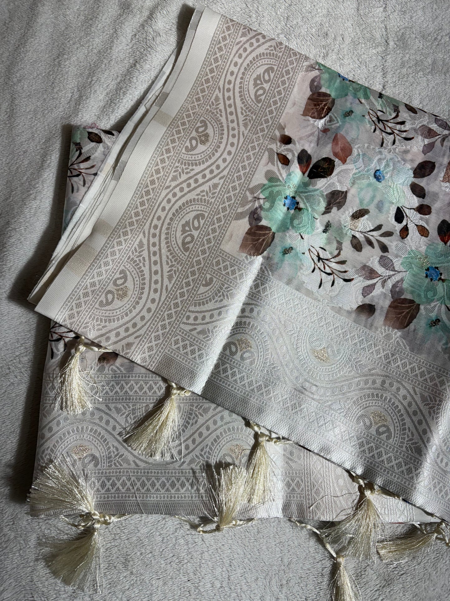 White cotton silk saree with Rama green floral print allover