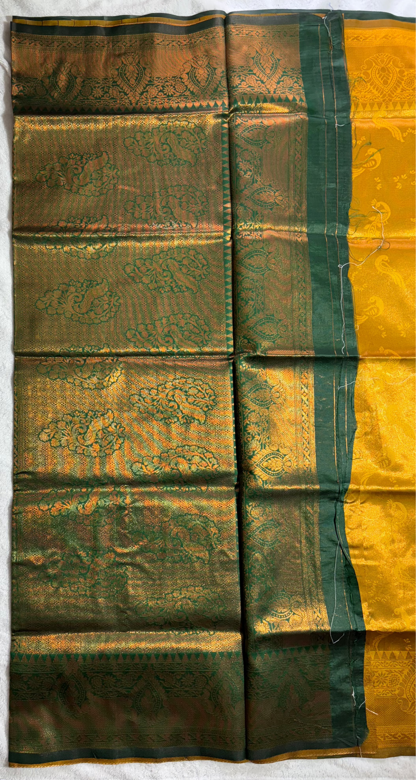 Mustard yellow with contrast dark green semi silk saree