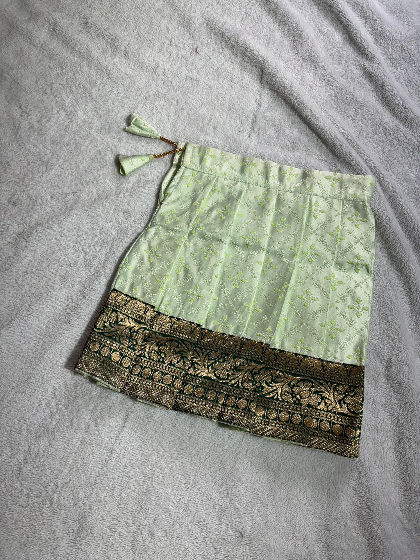 Dark green blouse with pista green lehenga pattu pavadai blouse with
