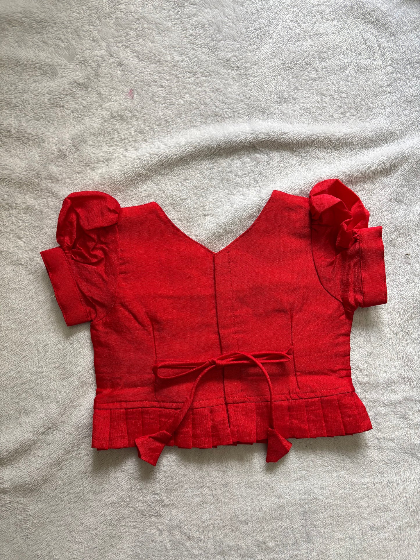 Red and half white pattu pavadai with handmade Ari work all over the jacquard blouse