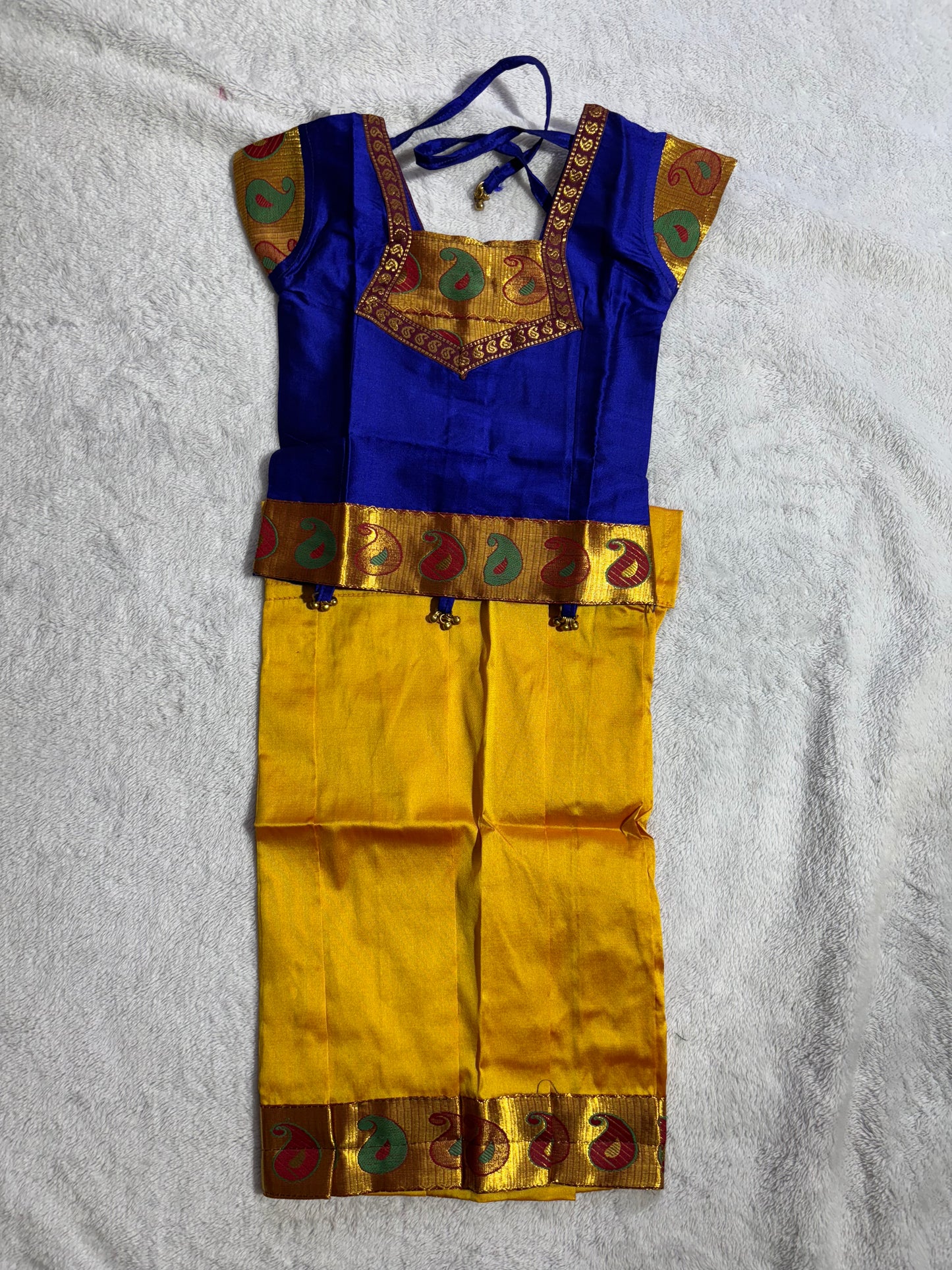 Pattu Pavade rich blue blouse paired with a mustard yellow lehenga