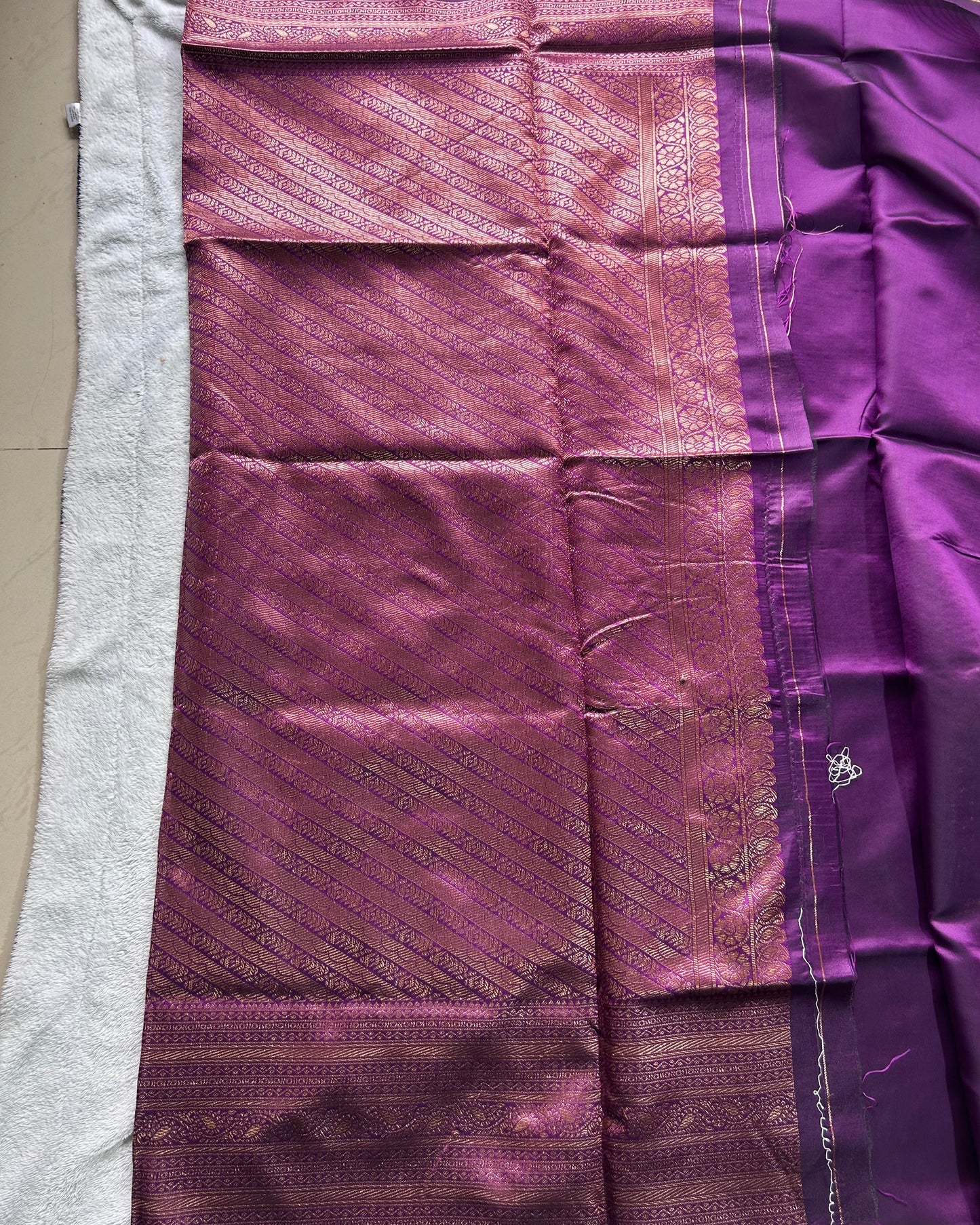 Violet semi silk fancy saree with all over zari work