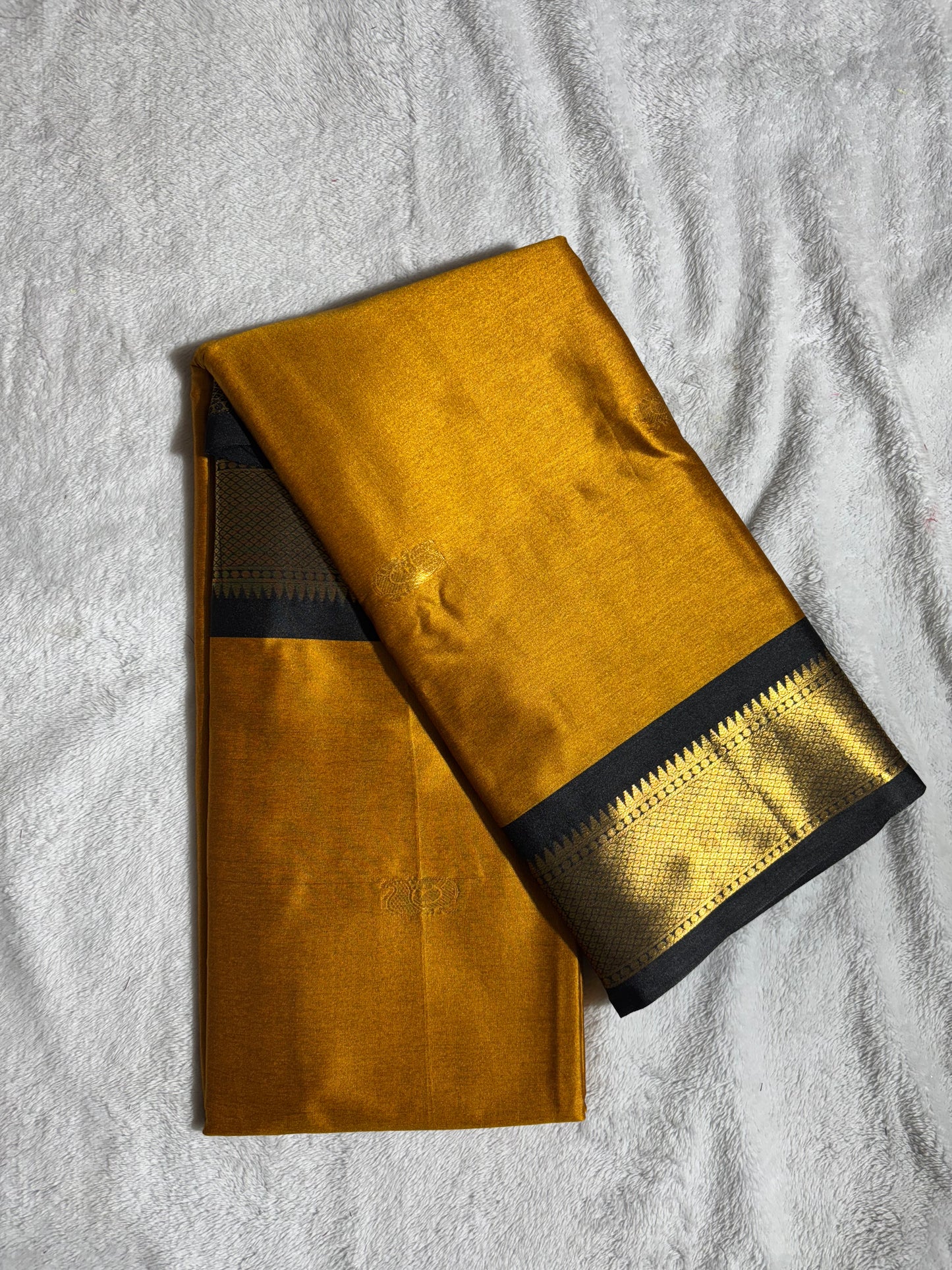 Mustard yellow with black silk cotton saree