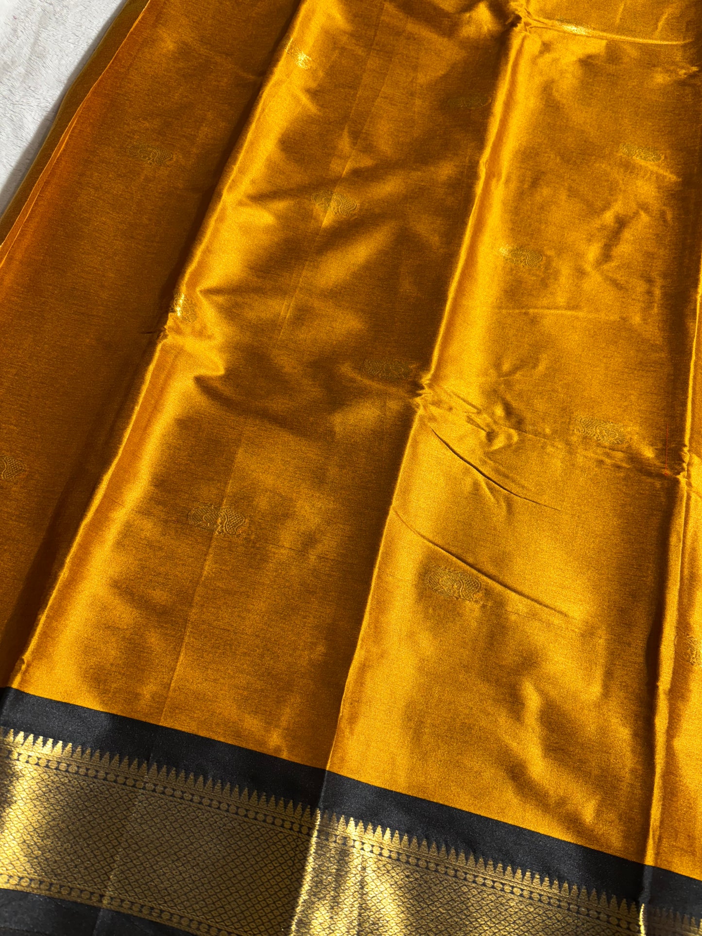 Mustard yellow with black silk cotton saree
