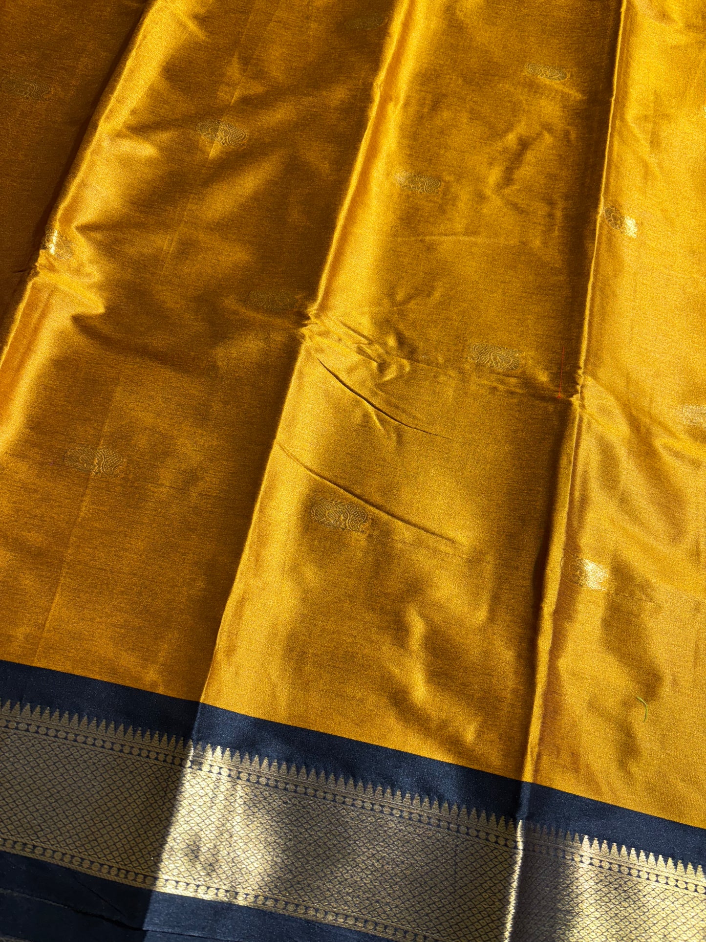 Mustard yellow with black silk cotton saree