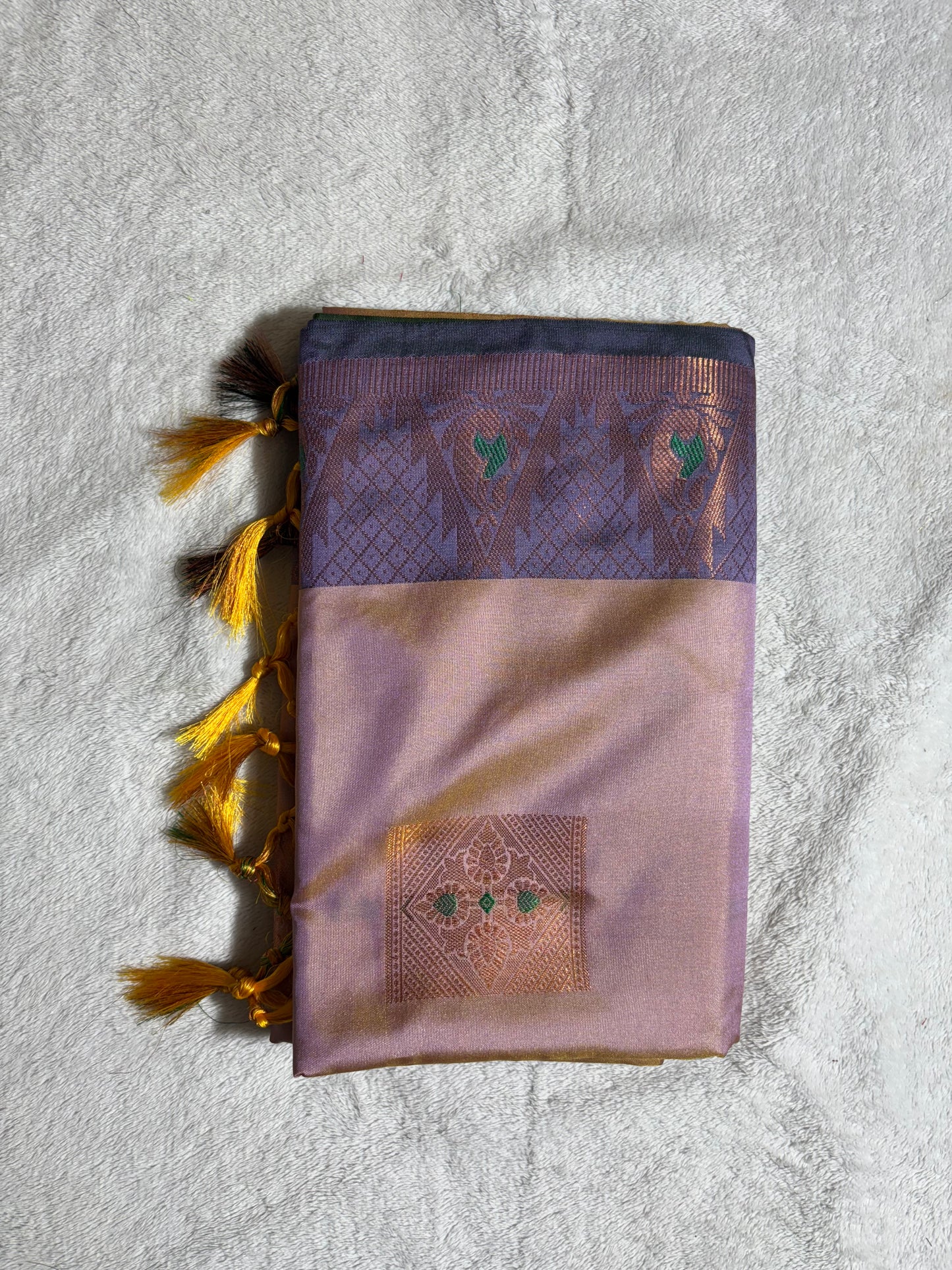 Lavender with purple soft silk saree wth temple border and tassels