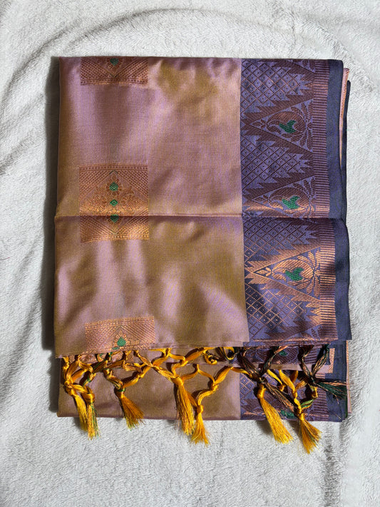 Lavender with purple soft silk saree wth temple border and tassels