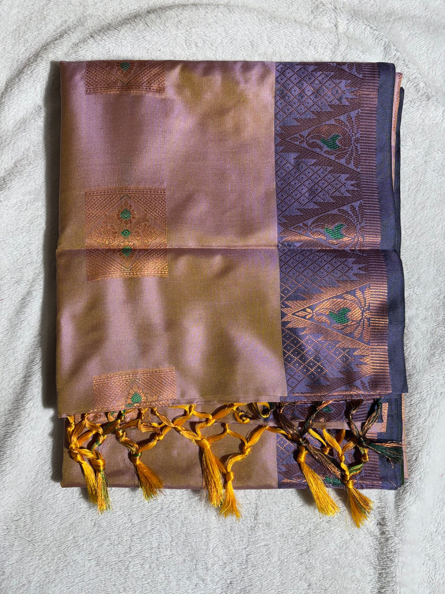 Lavender with purple soft silk saree wth temple border and tassels