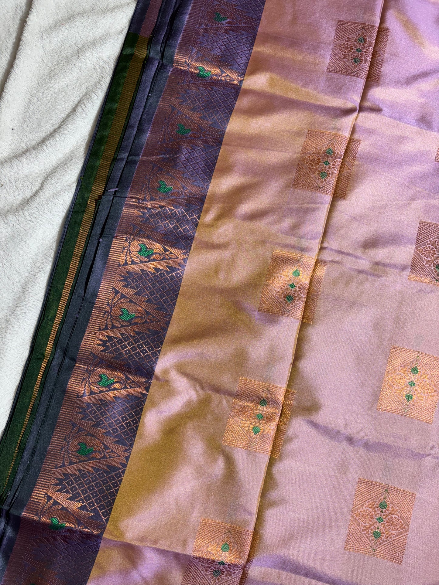 Lavender with purple soft silk saree wth temple border and tassels