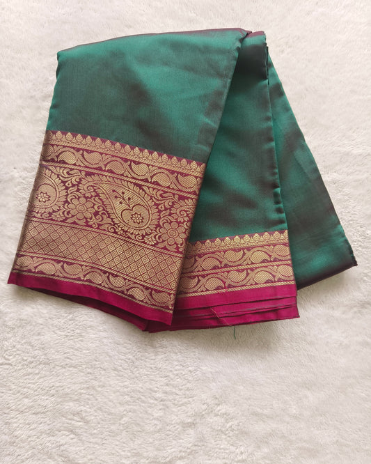 Elegant Semi Silk Saree in Teal Green & Pink with Rich Zari Border